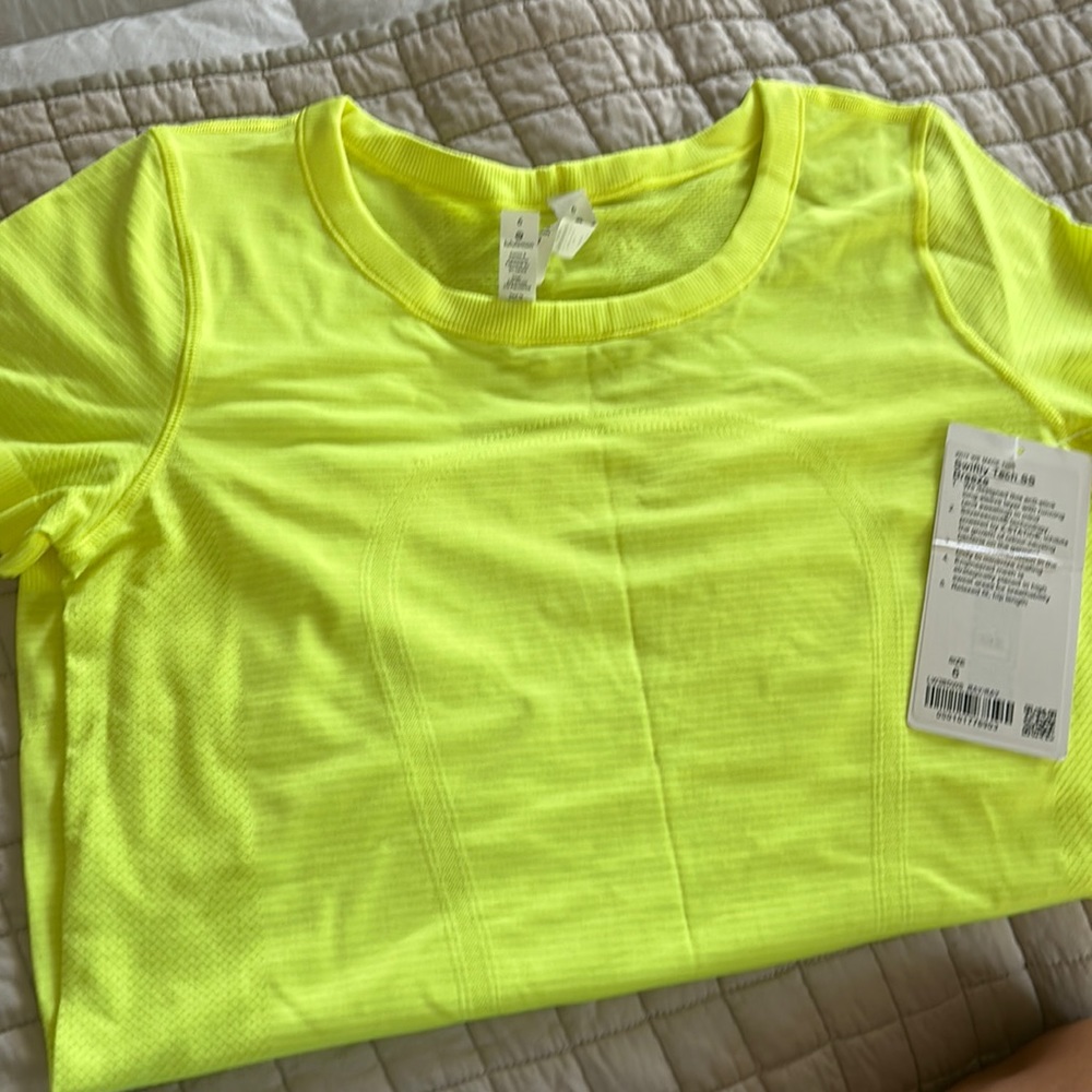 Never worn size 6 swiftly tech breeze yellow shirt